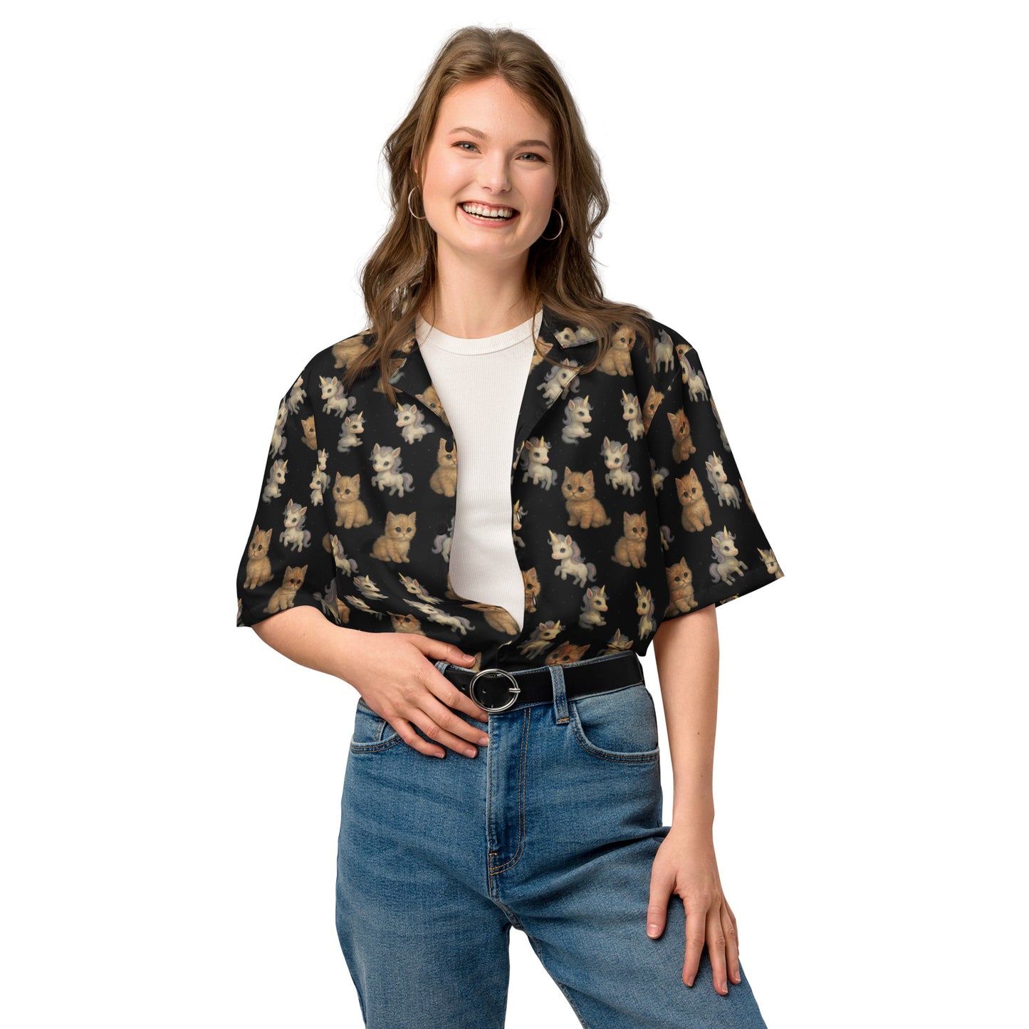 Woman wearing a black shirt with dog pattern and blue jeans on a white background