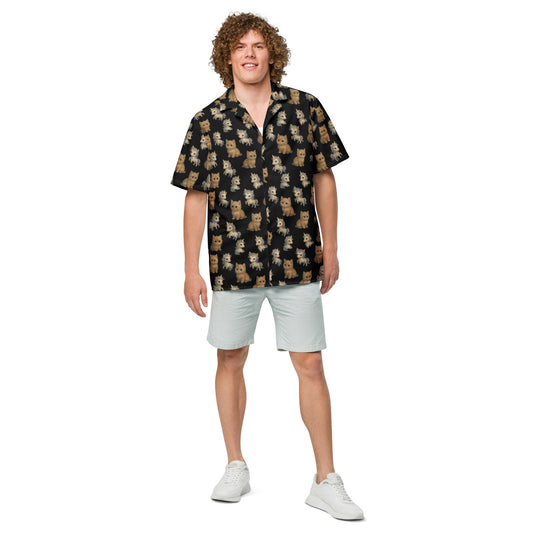 Man wearing a patterned shirt and light shorts on a white background