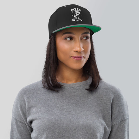 woman wearing Black hat with white text "Pizza is a lifestyle"