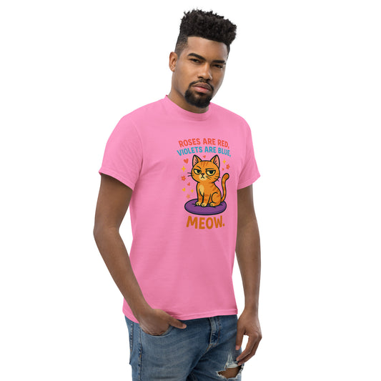 Man wearing a pink t-shirt with a cat graphic and text on a white background