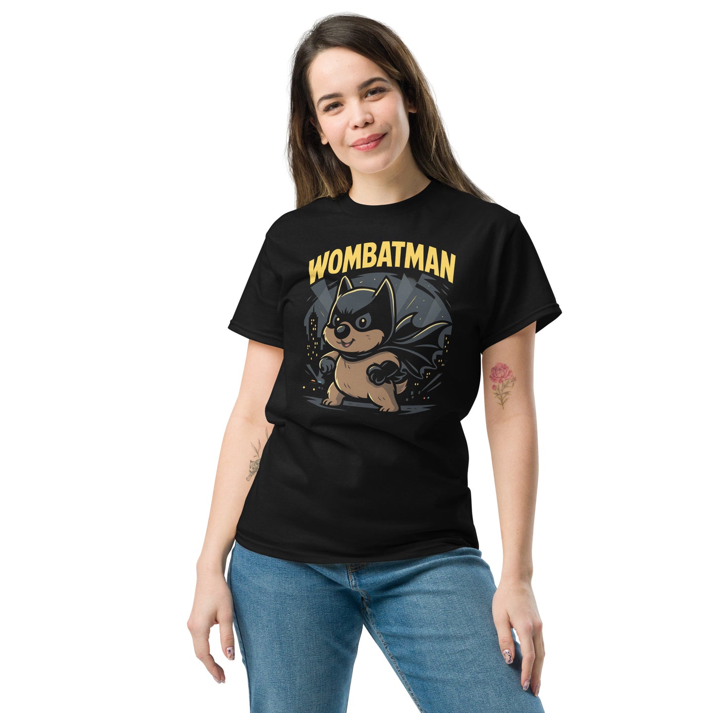 Person wearing a black t-shirt with 'Wombatman' graphic design on a white background