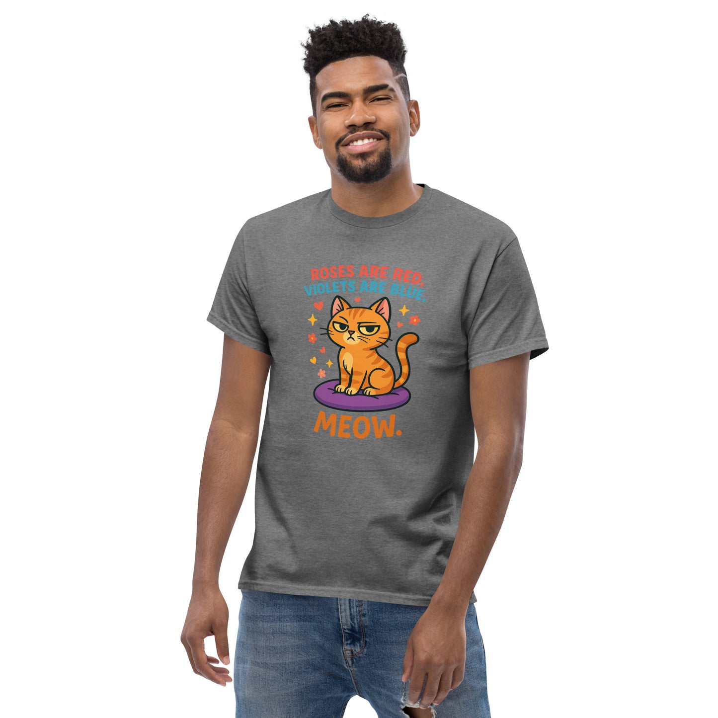 Man wearing a gray t-shirt with a cat graphic and text on a white background