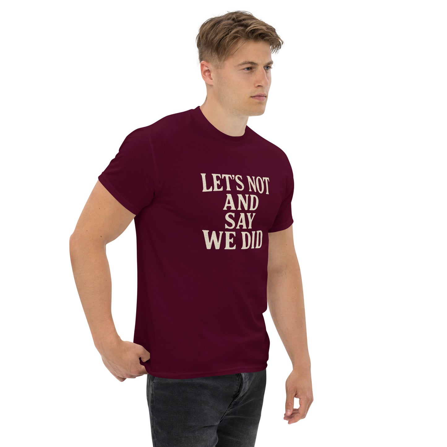 Man wearing a maroon t-shirt with white text on a white background