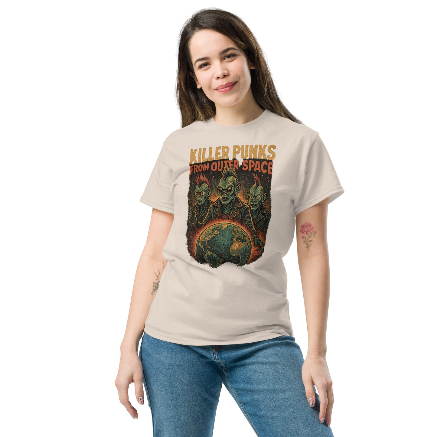 woman wearing cream shirt with alien punks and the earth with the text "Killer punks from outer space" on white background