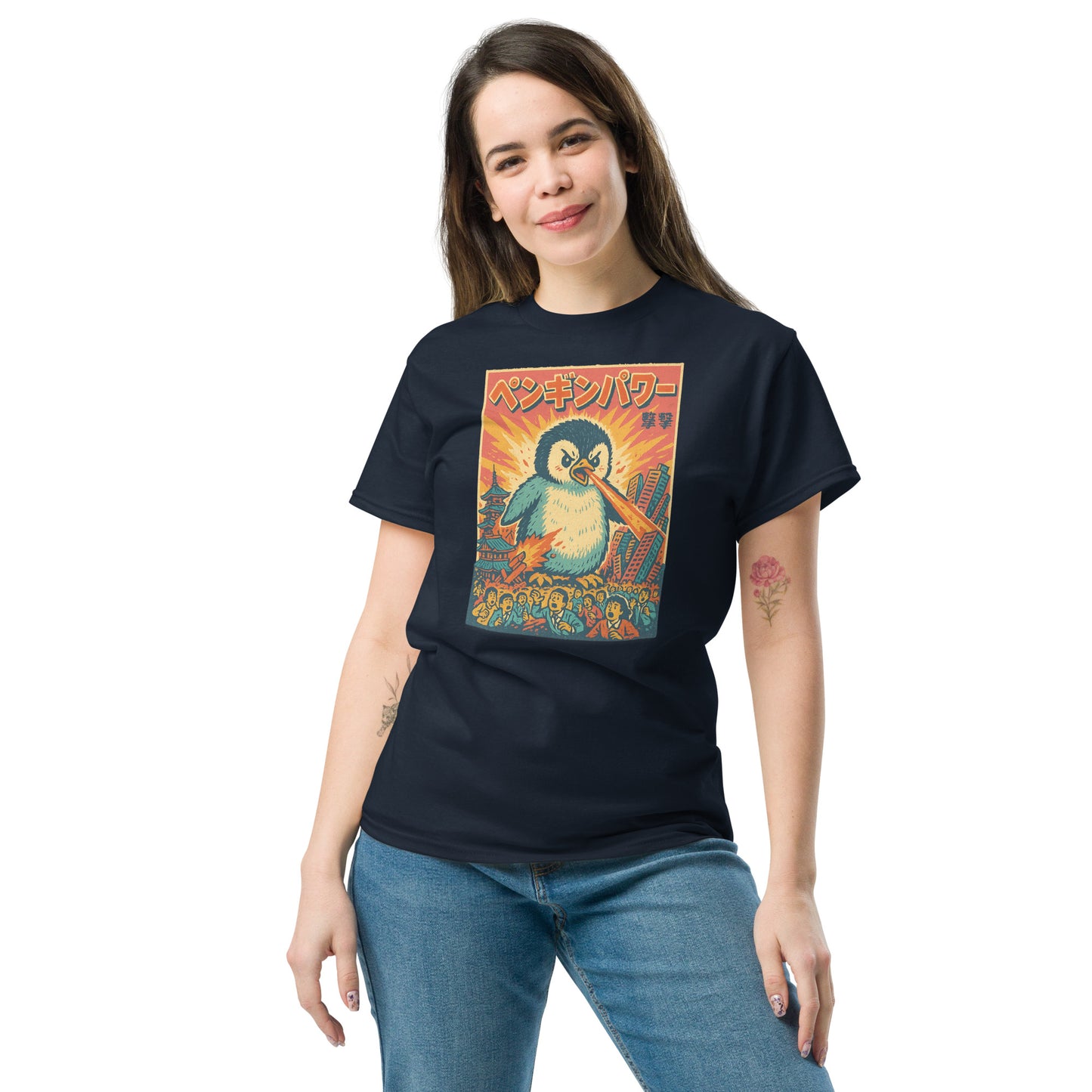 Woman wearing a black t-shirt with a colorful penguin graphic design on a white background