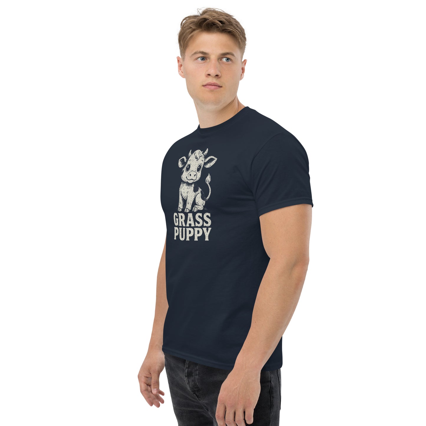 Man wearing a navy blue t-shirt with a graphic of a cow and 'Grass Puppy' text on a white background