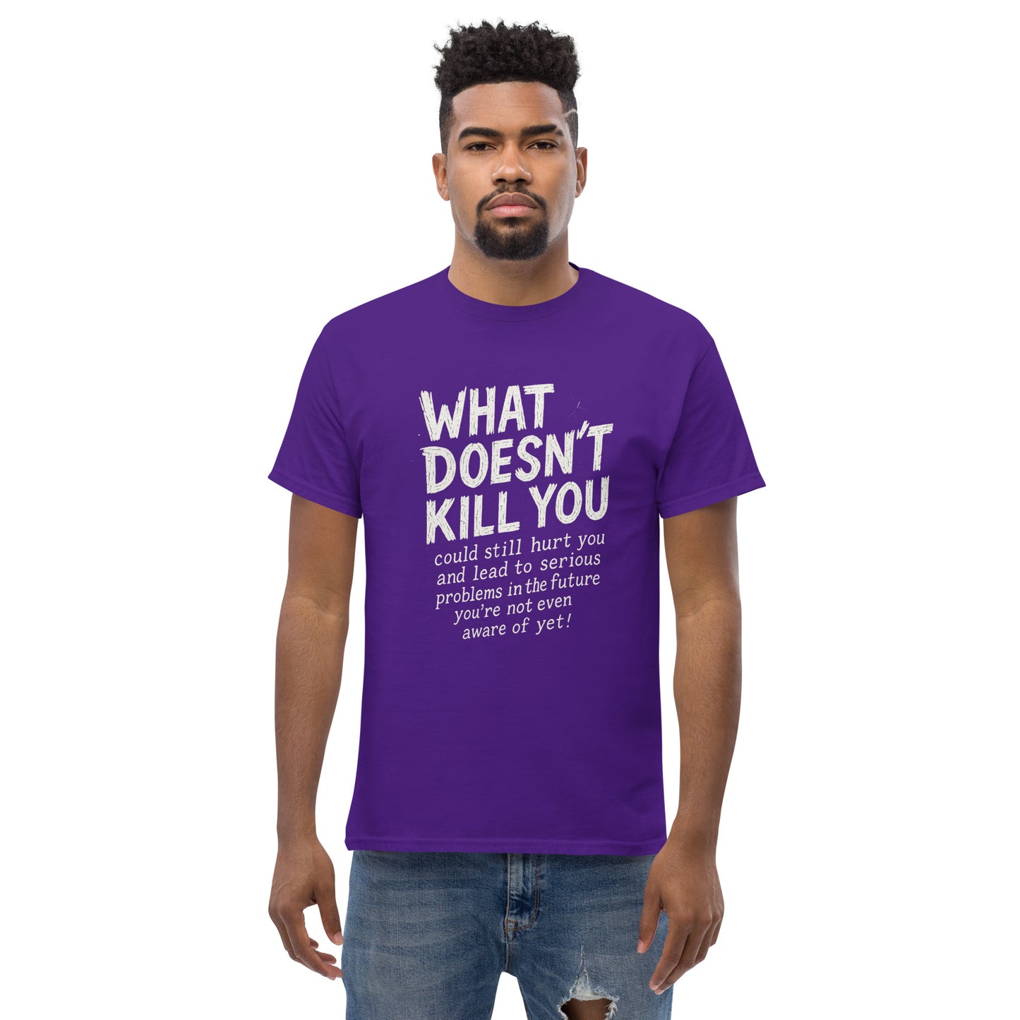 Man wearing a purple t-shirt with a motivational quote on a white background