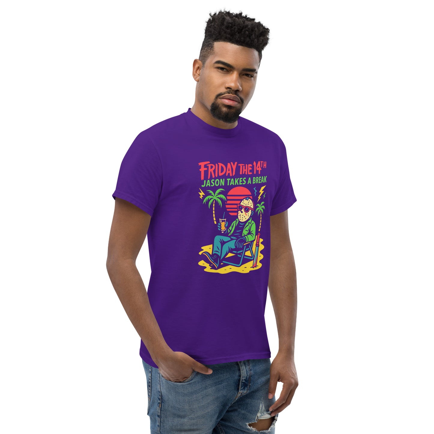 Man wearing a purple t-shirt with a graphic design on a white background
