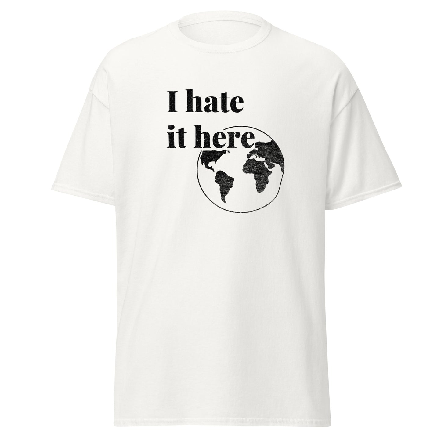 White t-shirt with 'I hate it here' text and world map graphic on a white background