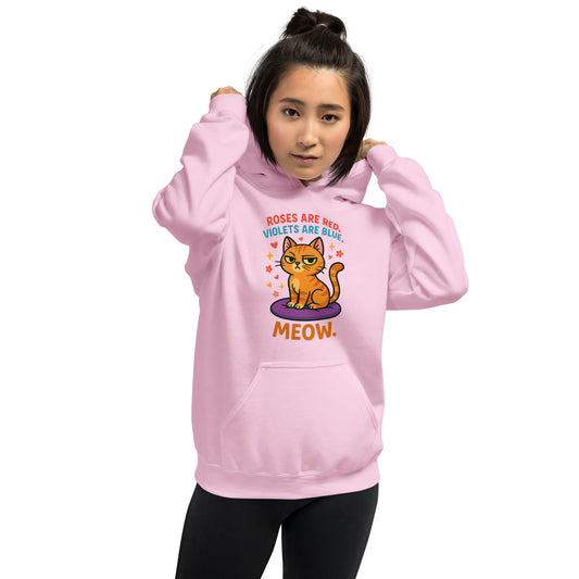 Person wearing a pink hoodie with a cat graphic and text on a white background