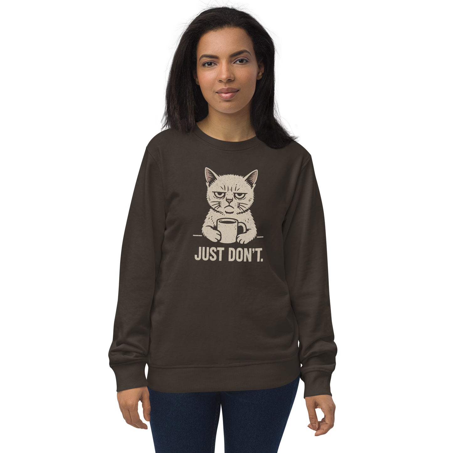 Woman wearing a dark brown sweatshirt with a cat graphic and text on a white background