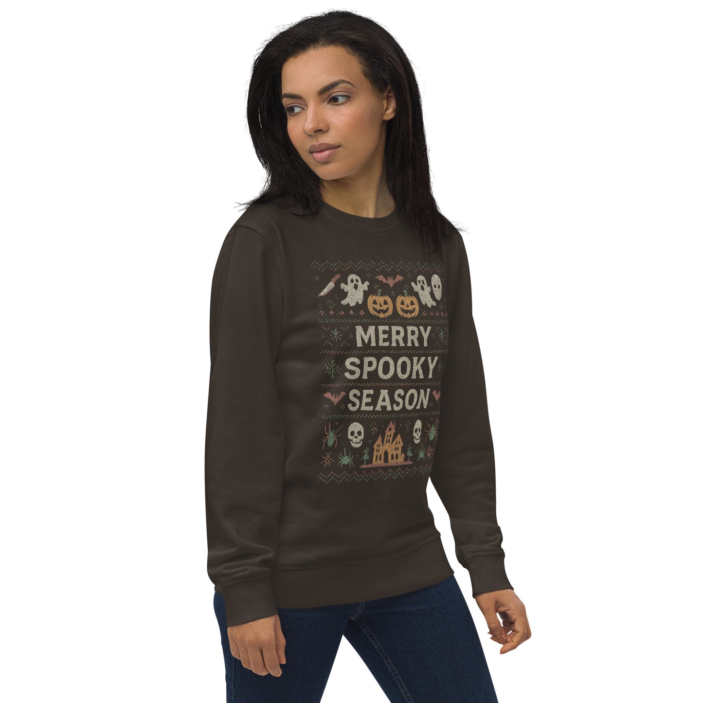Woman wearing a brown sweatshirt with Halloween-themed design on a white background