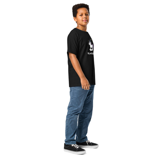Child wearing a black t-shirt with a logo and blue jeans on a white background