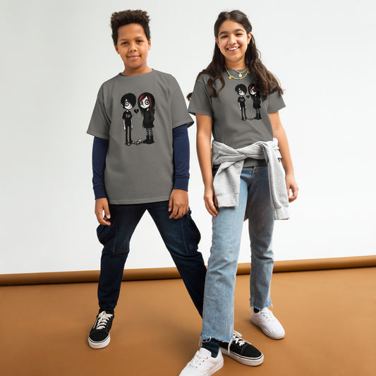 Two children wearing gray t-shirts with graphic designs on a white background.