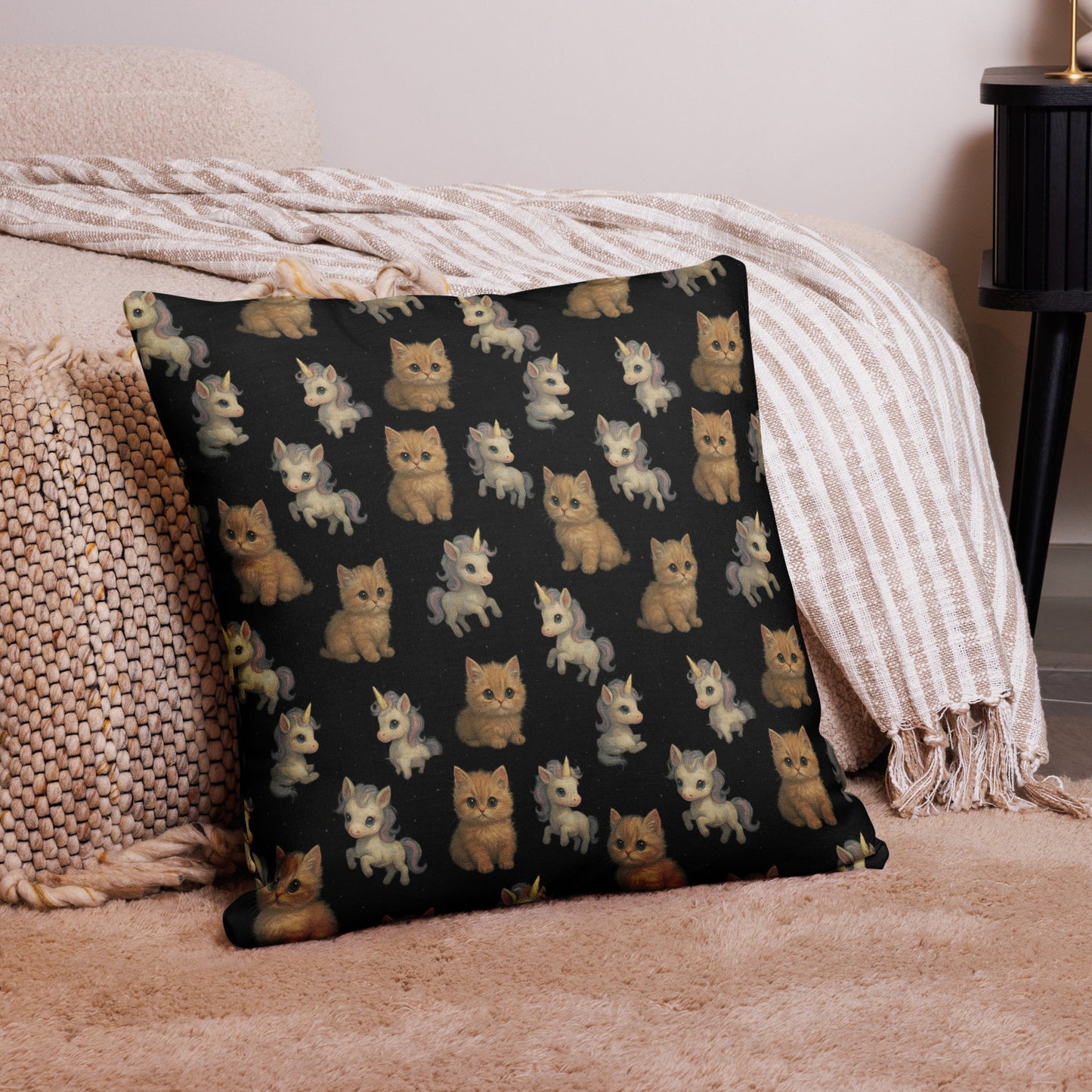 Decorative pillow with cat pattern on a couch