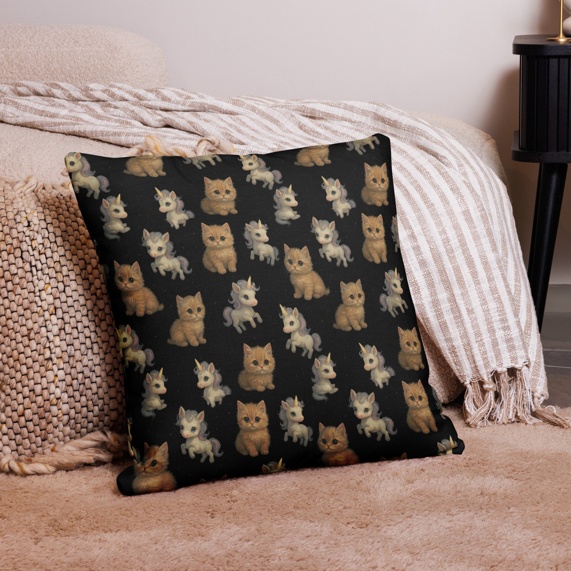 Decorative pillow with cat pattern on a bed
