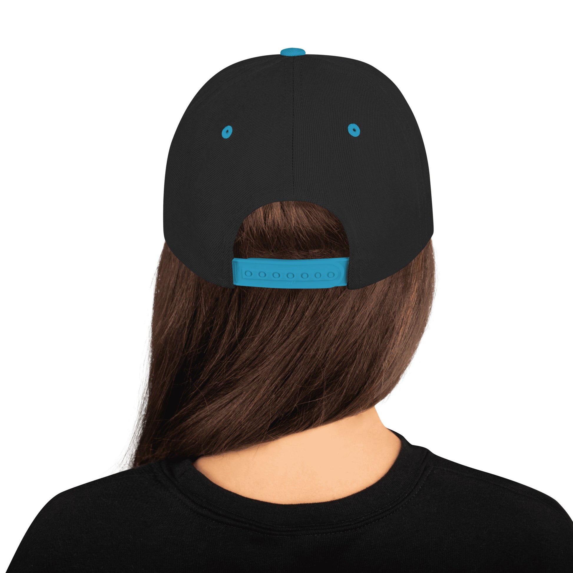 Black cap with blue accents worn by a person on a white background