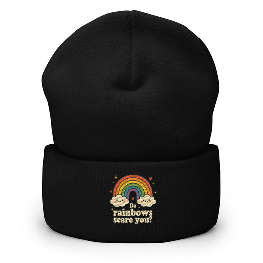 Black beanie with rainbow and cloud design on a white background