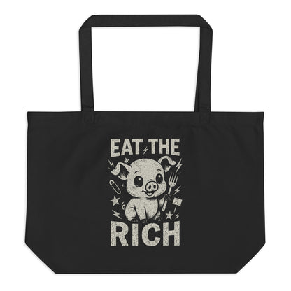 Black tote bag with a graphic of a pig and text 'Eat the Rich' on a white background