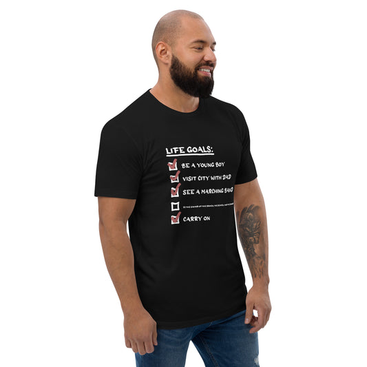 Man wearing a black t-shirt with text and checkboxes on a white background