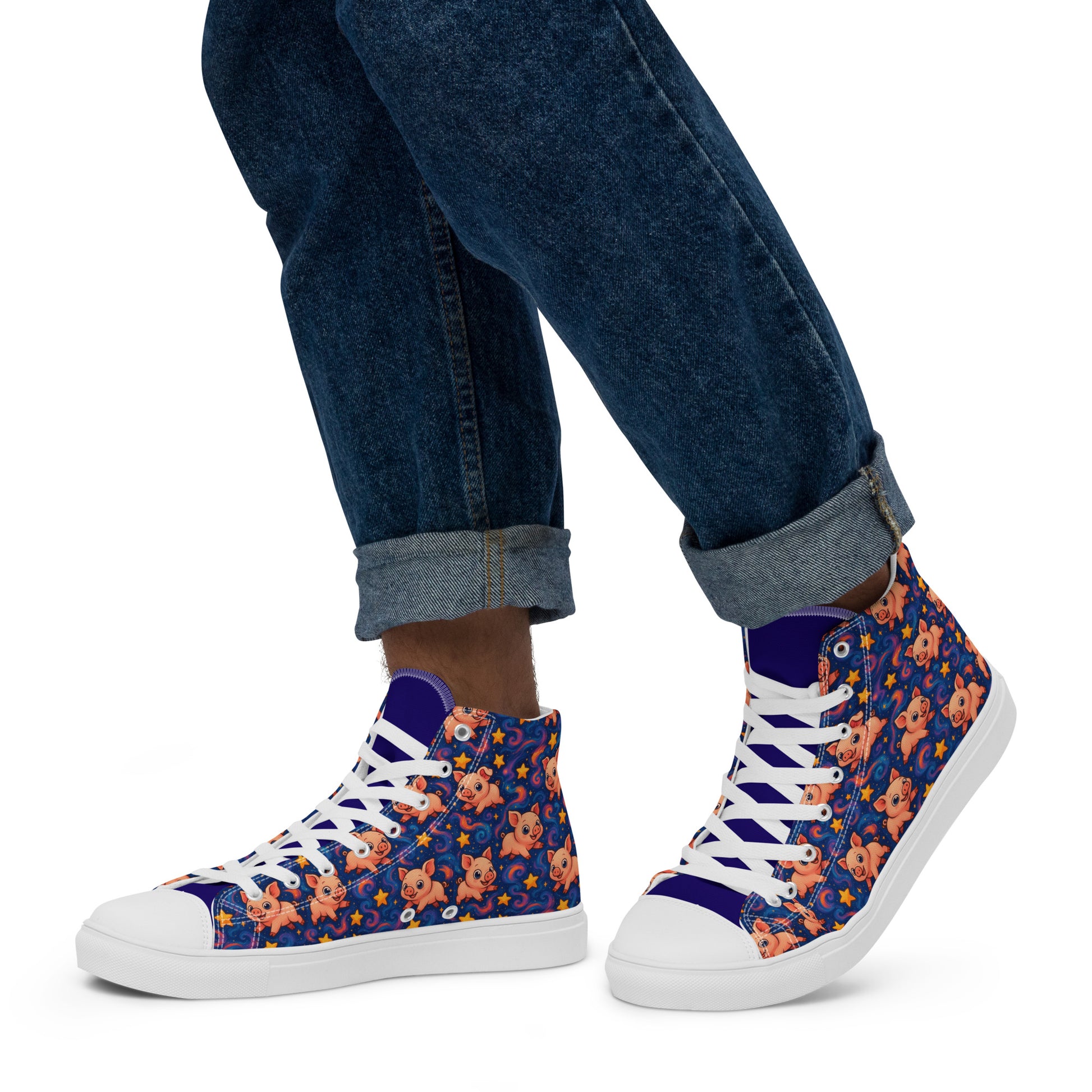 High-top sneakers with floral pattern worn with rolled-up jeans on a white background