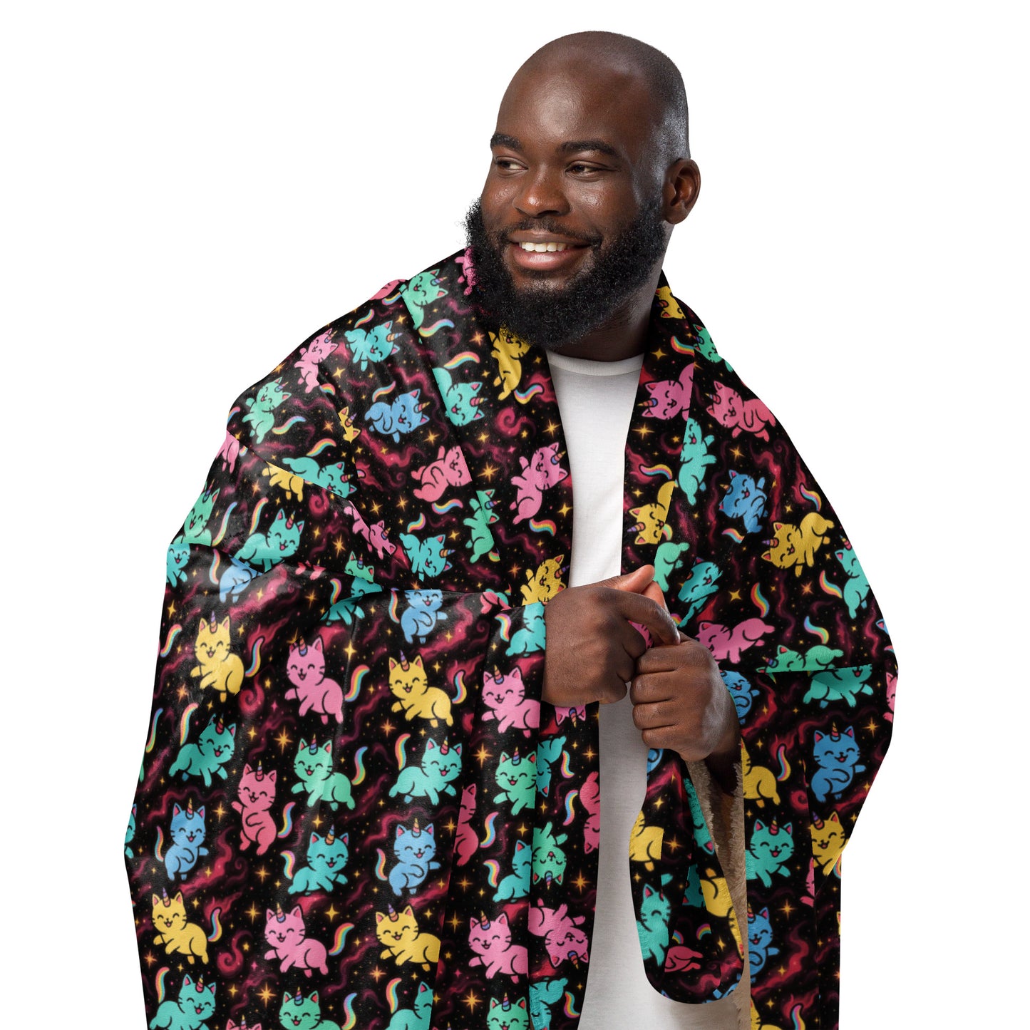 Man wearing a colorful cat patterned robe on a white background