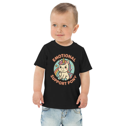 Child wearing a black t-shirt with a colorful graphic and text on a white background