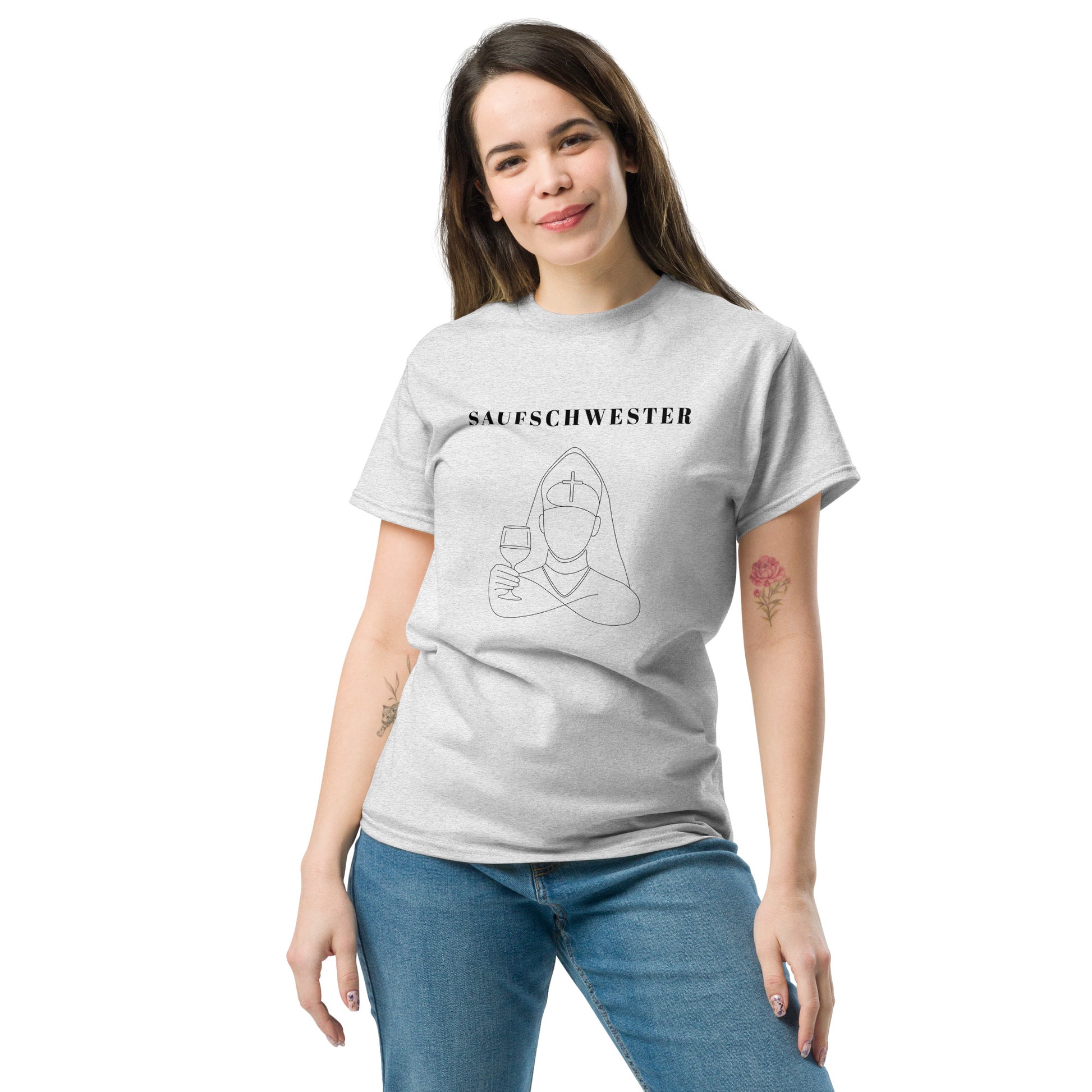 Woman wearing a gray t-shirt with a graphic design and text on a white background