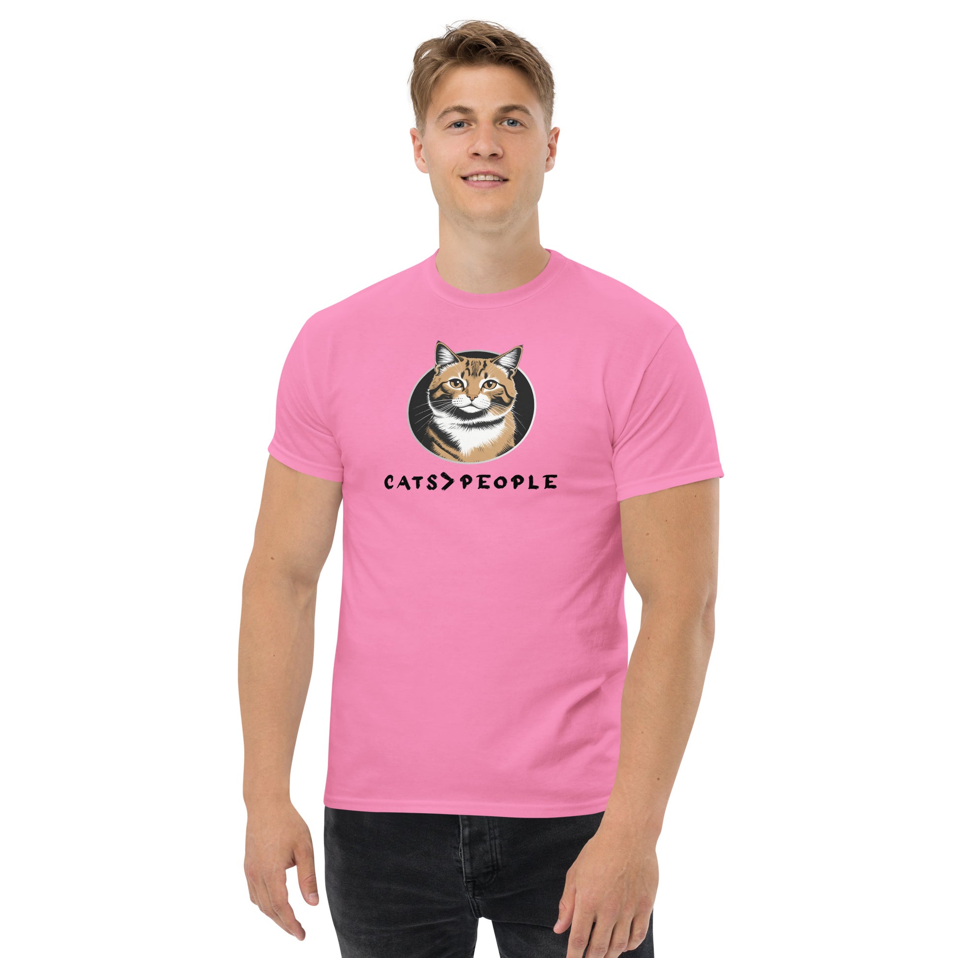 Person wearing a pink t-shirt with a cat graphic and text on a white background
