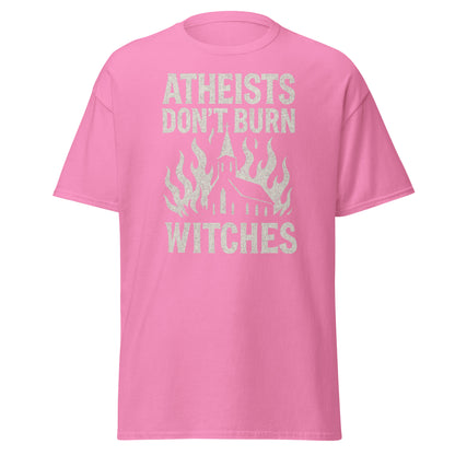 Pink t-shirt with text 'Atheists Don't Burn Witches' on a white background