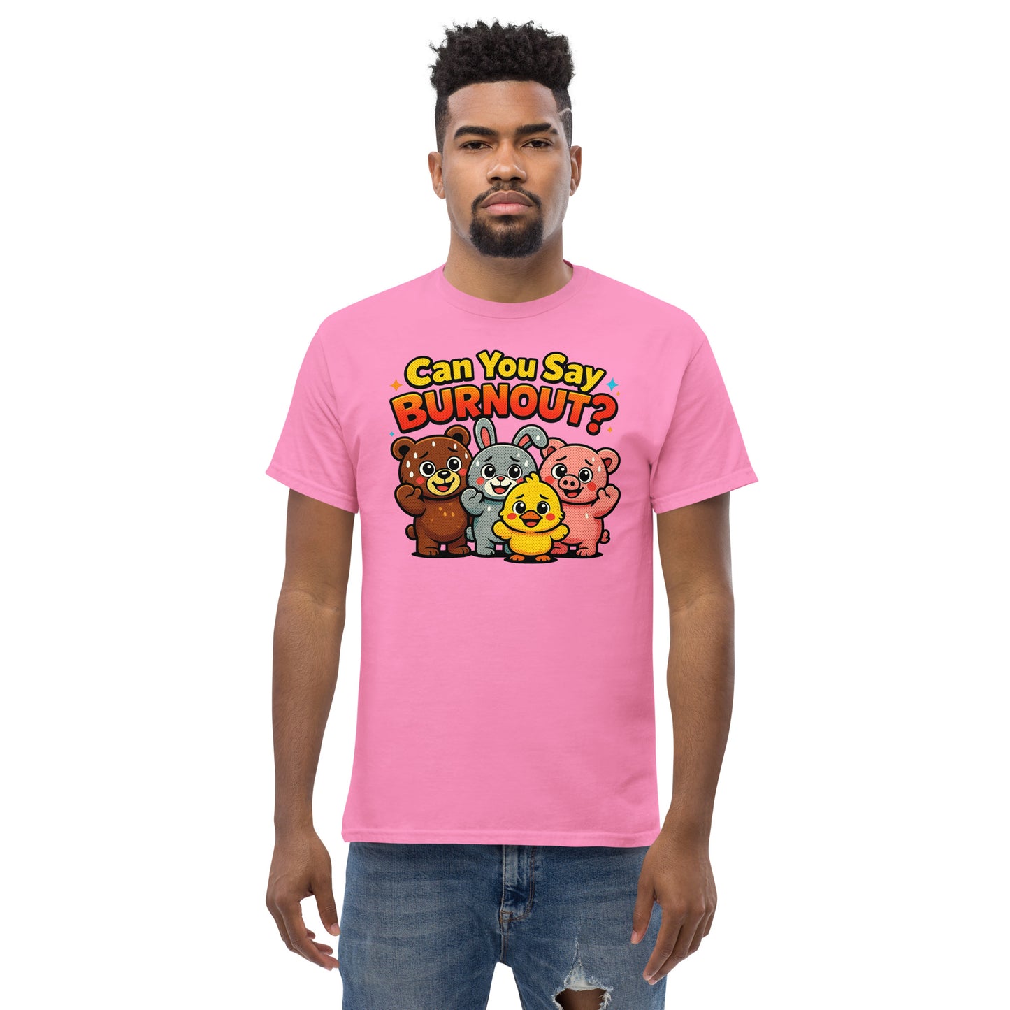 A man wearing a pink crewneck t-shirt with a cartoon graphic of four bears and a bunny under the text 'Can You Say BURNOUT?'.