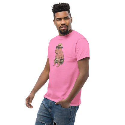 Man wearing pink Unisex Happybara t-shirt with quirky animal design, front view