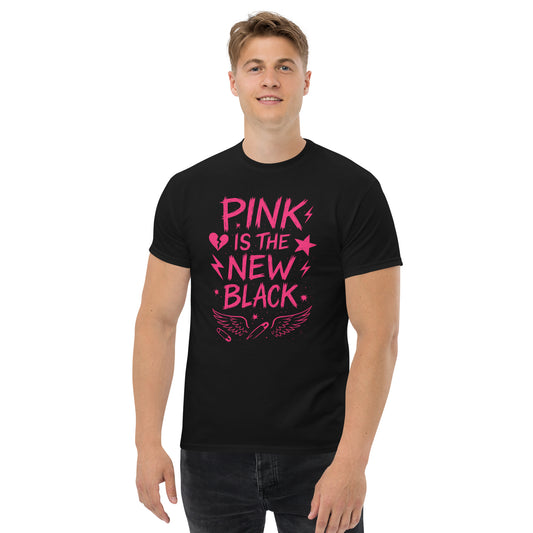 Person wearing a black t-shirt with pink text on a white background