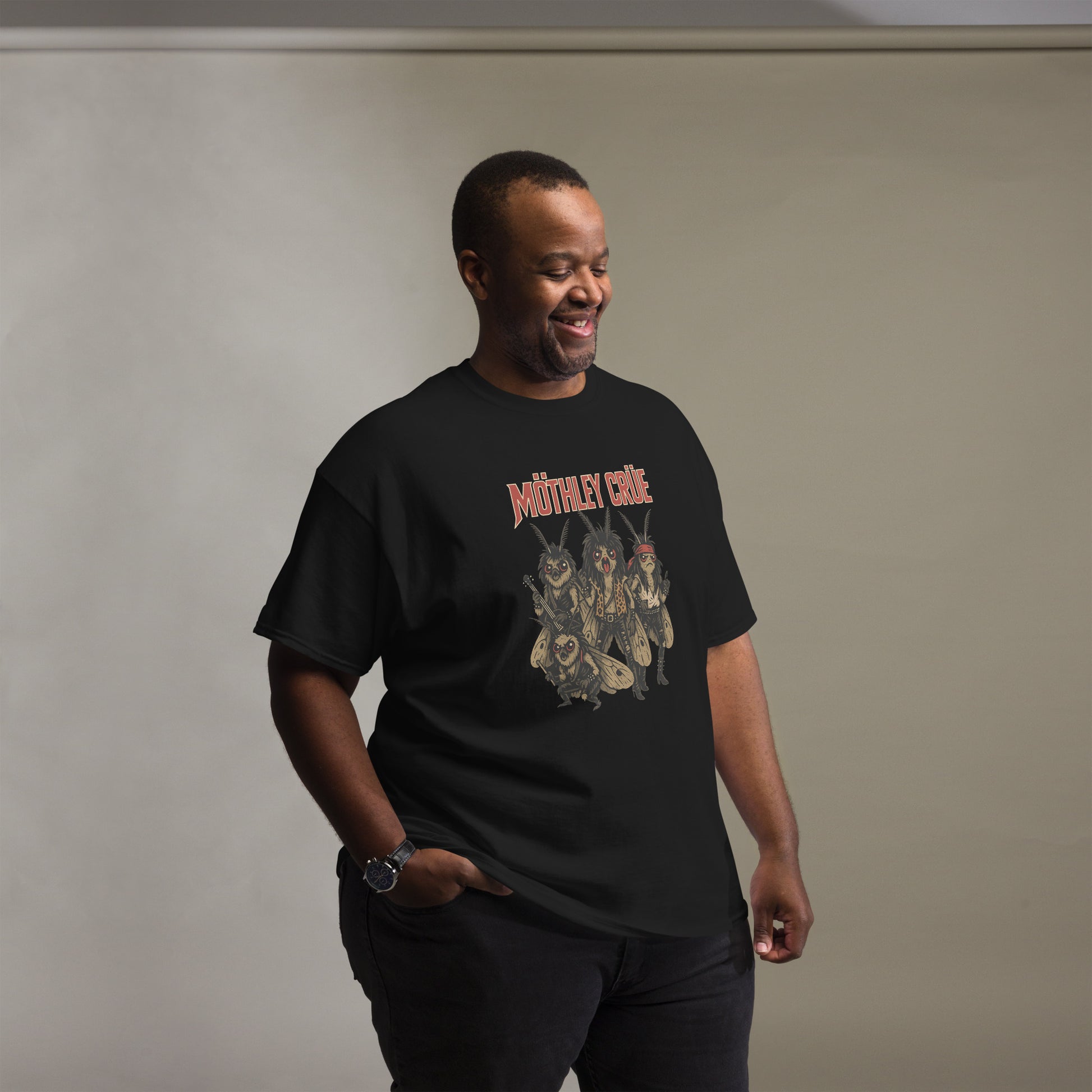 man wearing black Unisex Mothley Crüe t-shirt with chaotic rock parody design, front view