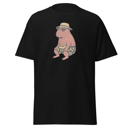 Black t-shirt with a graphic of a capibara wearing a hat and shorts on a white background