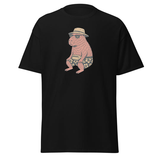 Black t-shirt with a graphic of a capibara wearing a hat and shorts on a white background