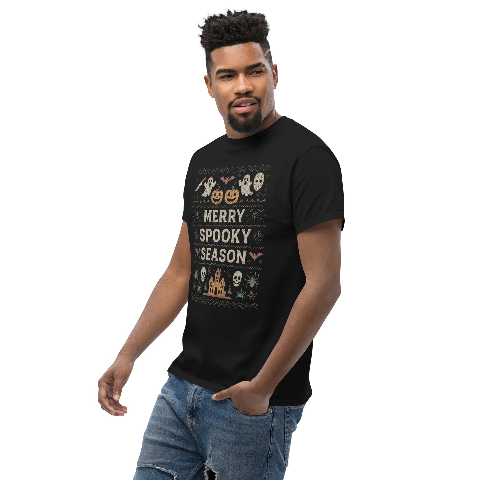 Man wearing a black t-shirt with Halloween-themed design on a white background