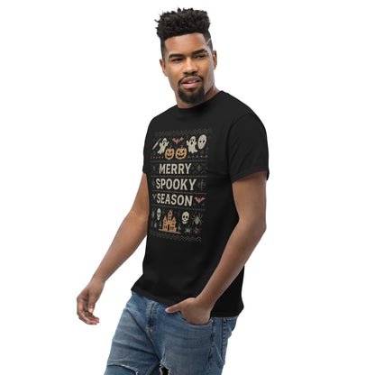 Man wearing a black t-shirt with Halloween-themed design on a white background