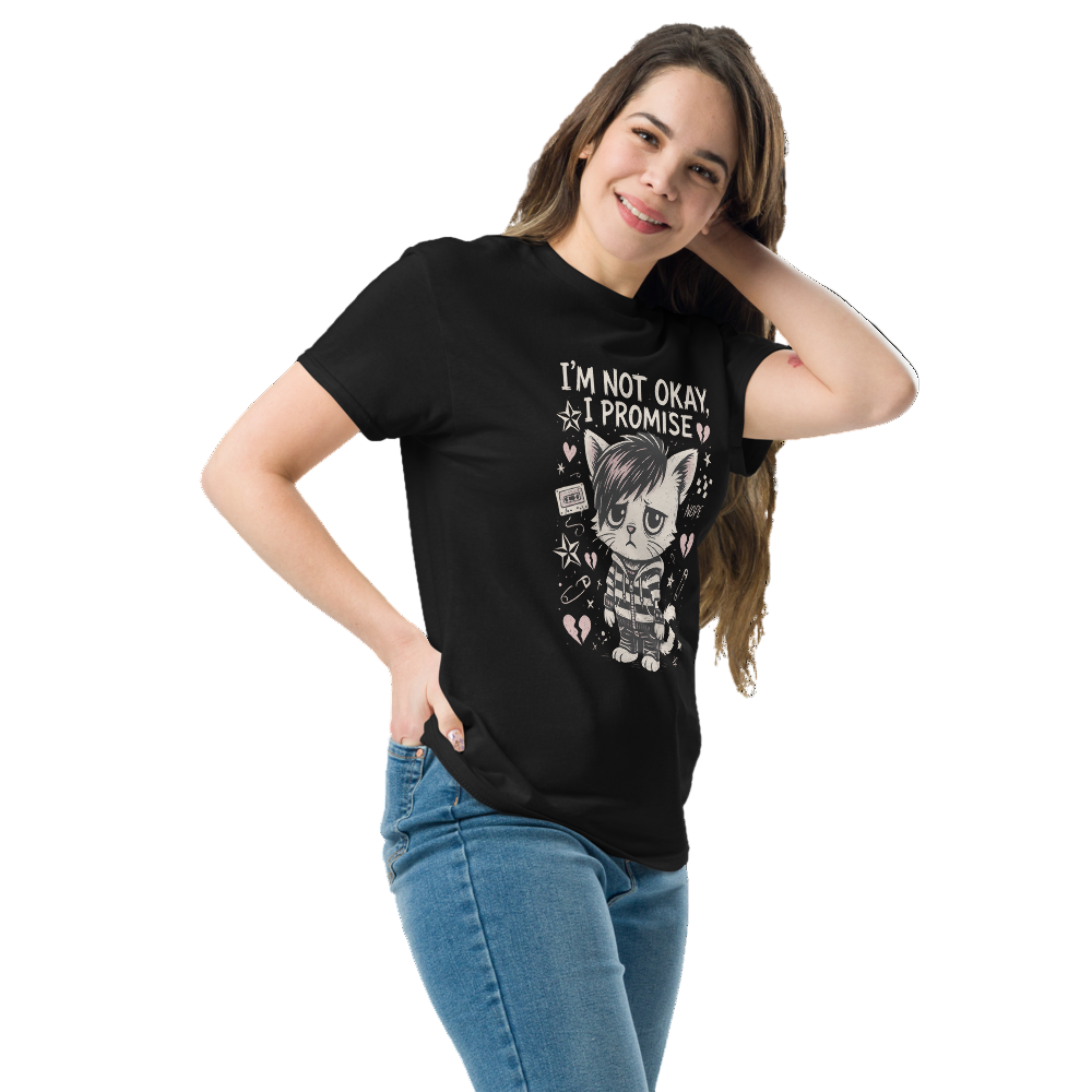Woman wearing a black t-shirt with a graphic design and text, standing against a white background