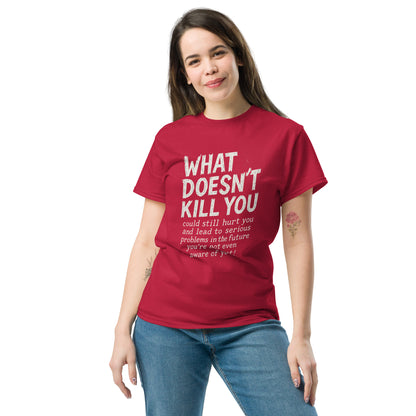 Person wearing a red t-shirt with text on a white background
