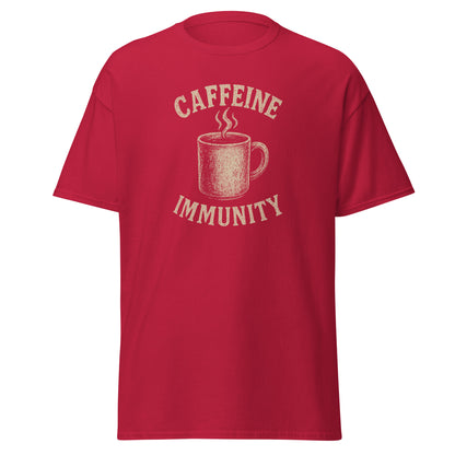 Red t-shirt with a graphic of a coffee cup and text 'CAFFEINE IMMUNITY' on a white background