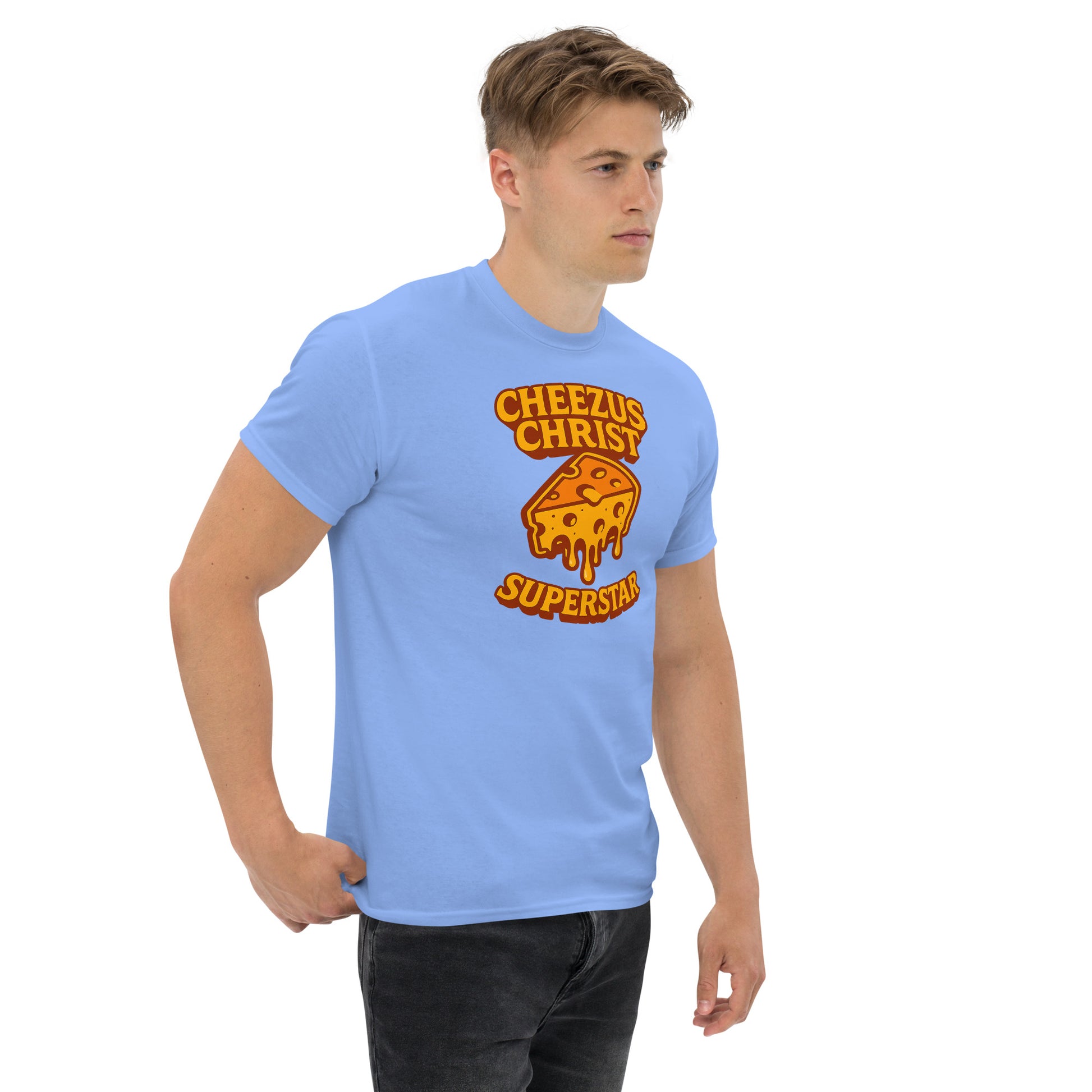 Man wearing a light blue t-shirt with a graphic design and text on a white background