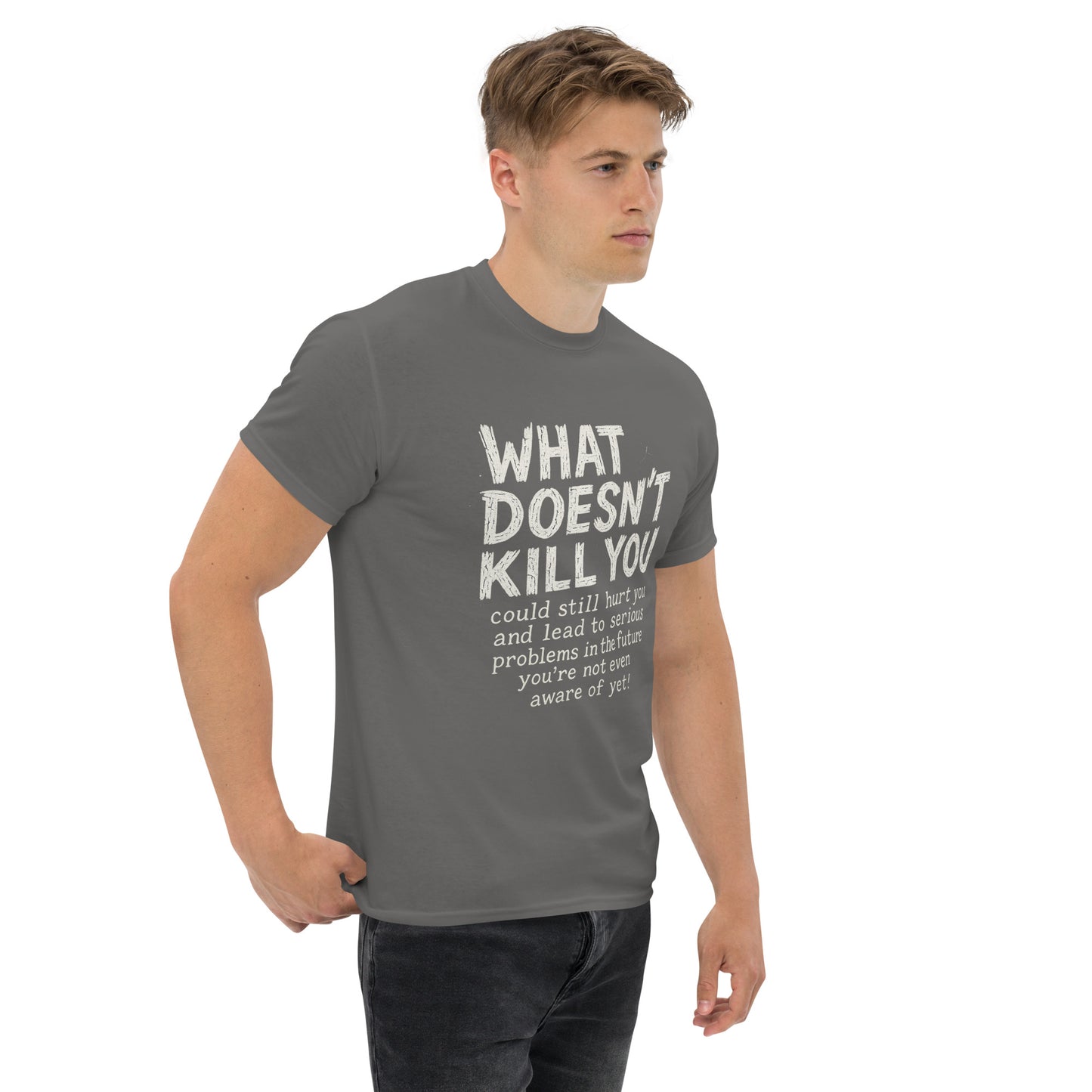 Man wearing a gray t-shirt with a motivational quote on a white background