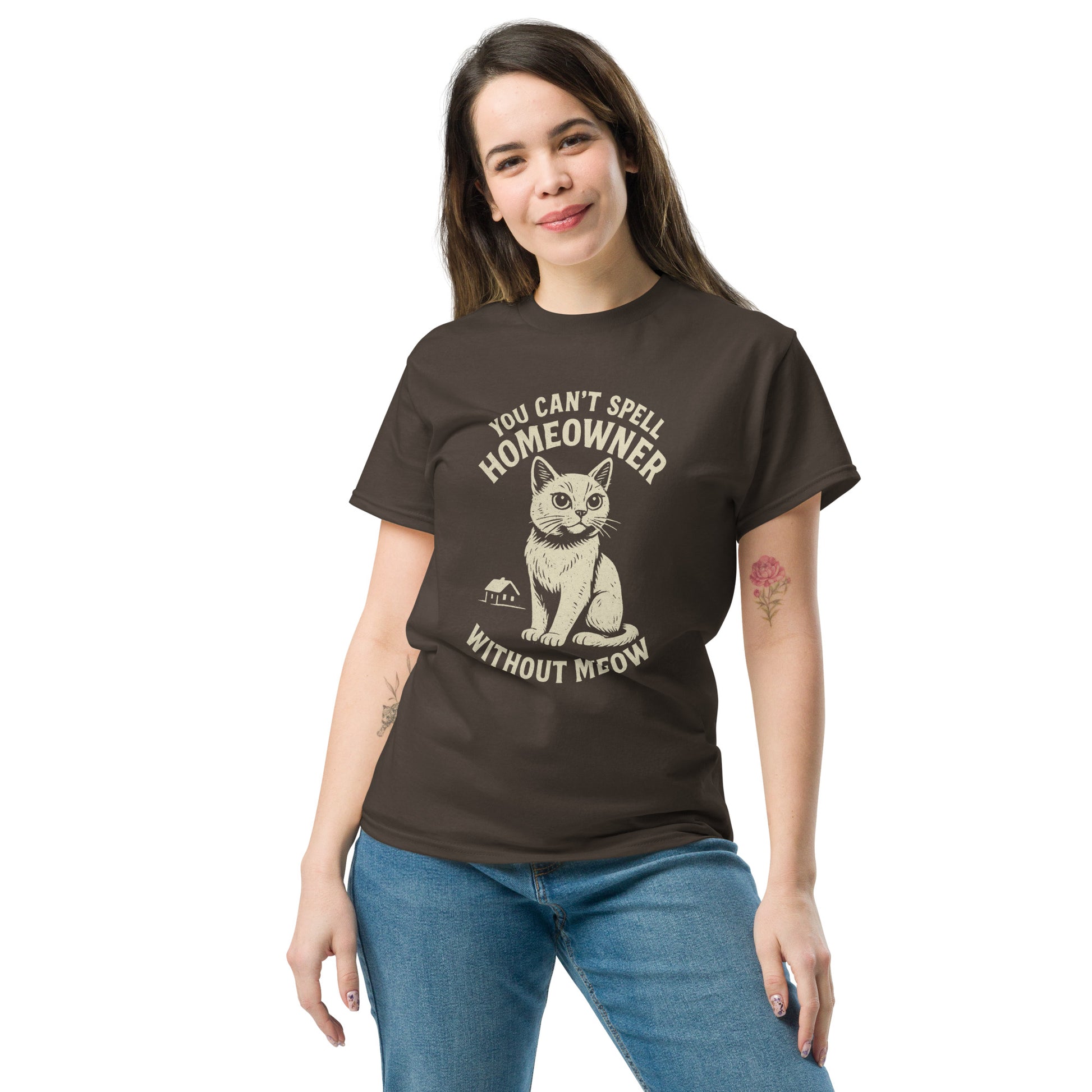 Woman wearing a brown t-shirt with a cat graphic and text on a white background