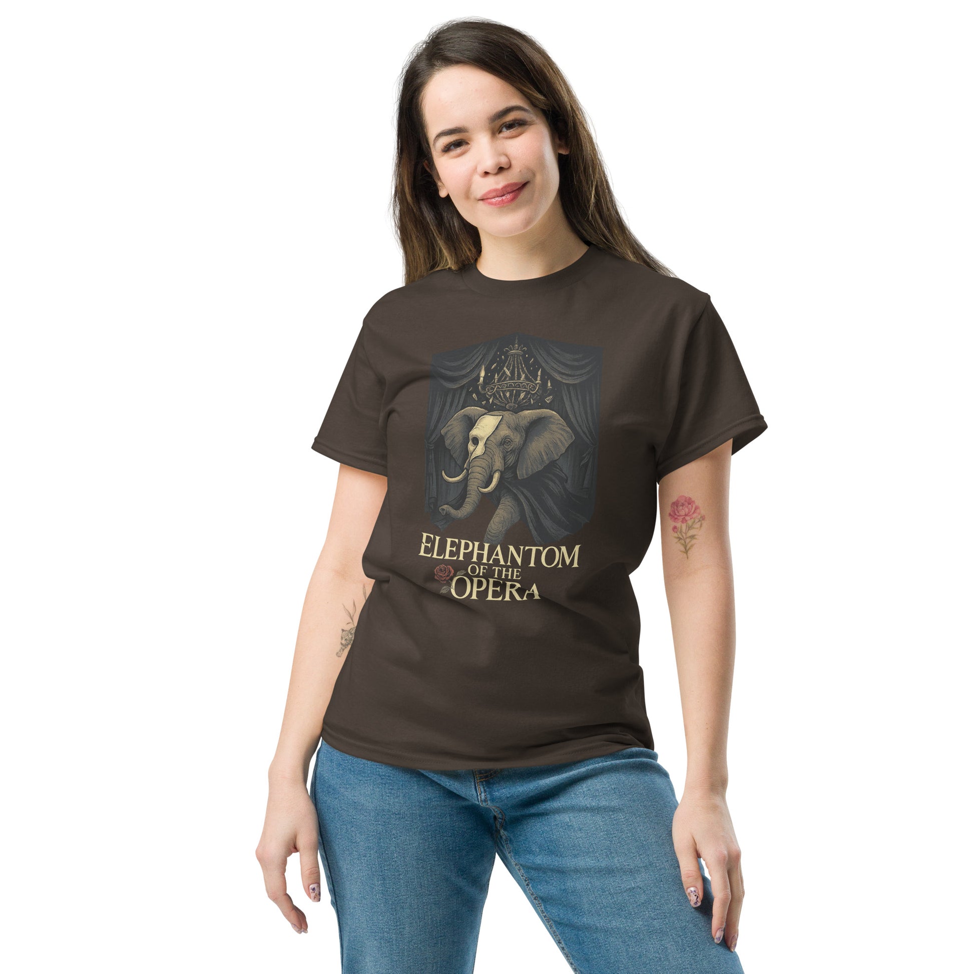 Woman wearing a brown t-shirt with 'elephantom of the opera' design on a white background