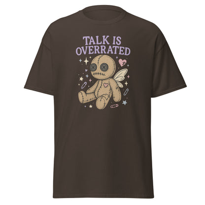 Brown t-shirt with a graphic of a voodoo doll and 'Talk is Overrated' text on a white background