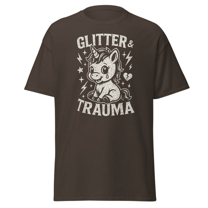 Brown t-shirt with unicorn graphic and 'Glitter & Trauma' text on a white background