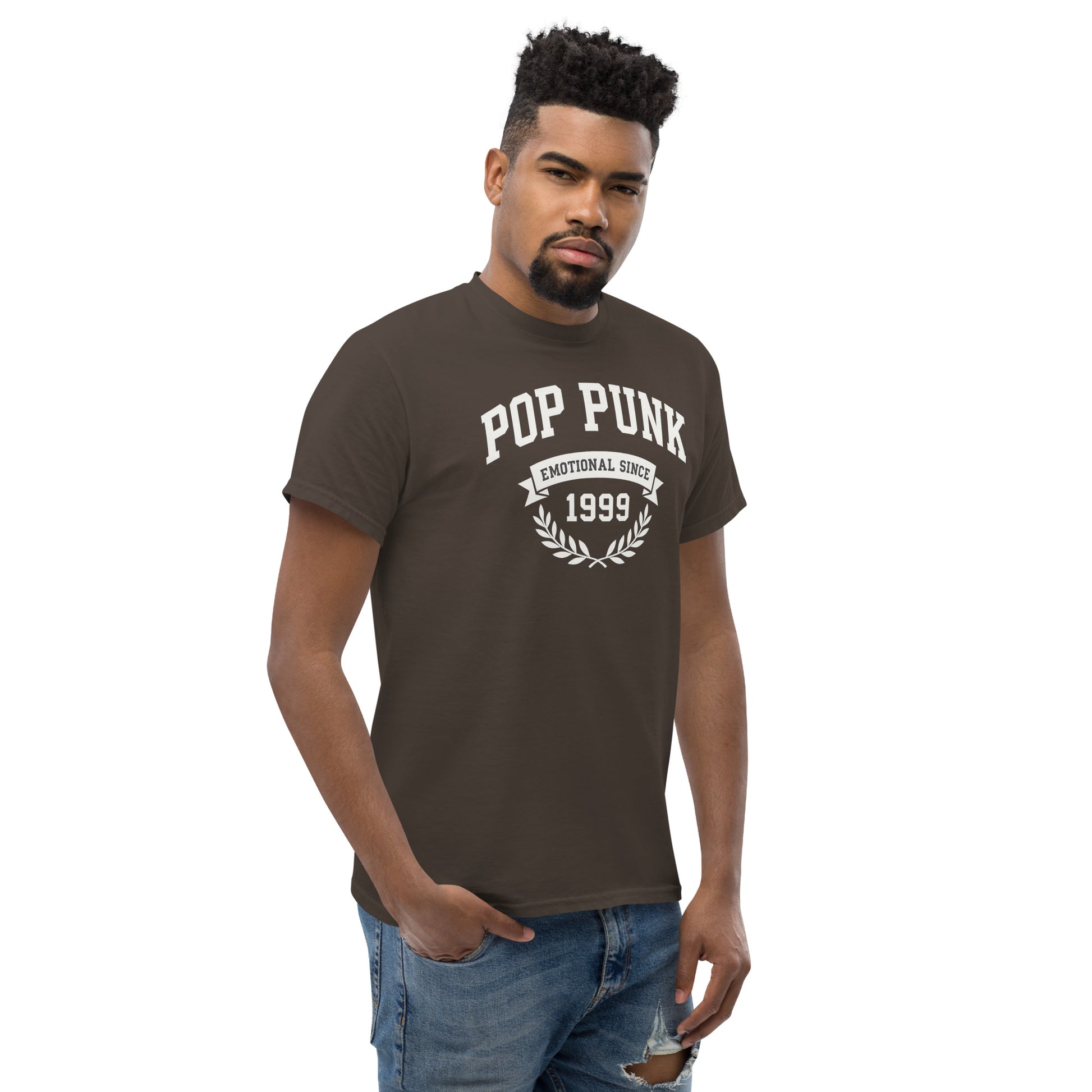 Man wearing a brown 'Pop Punk Emotional Since 1999' t-shirt on a white background
