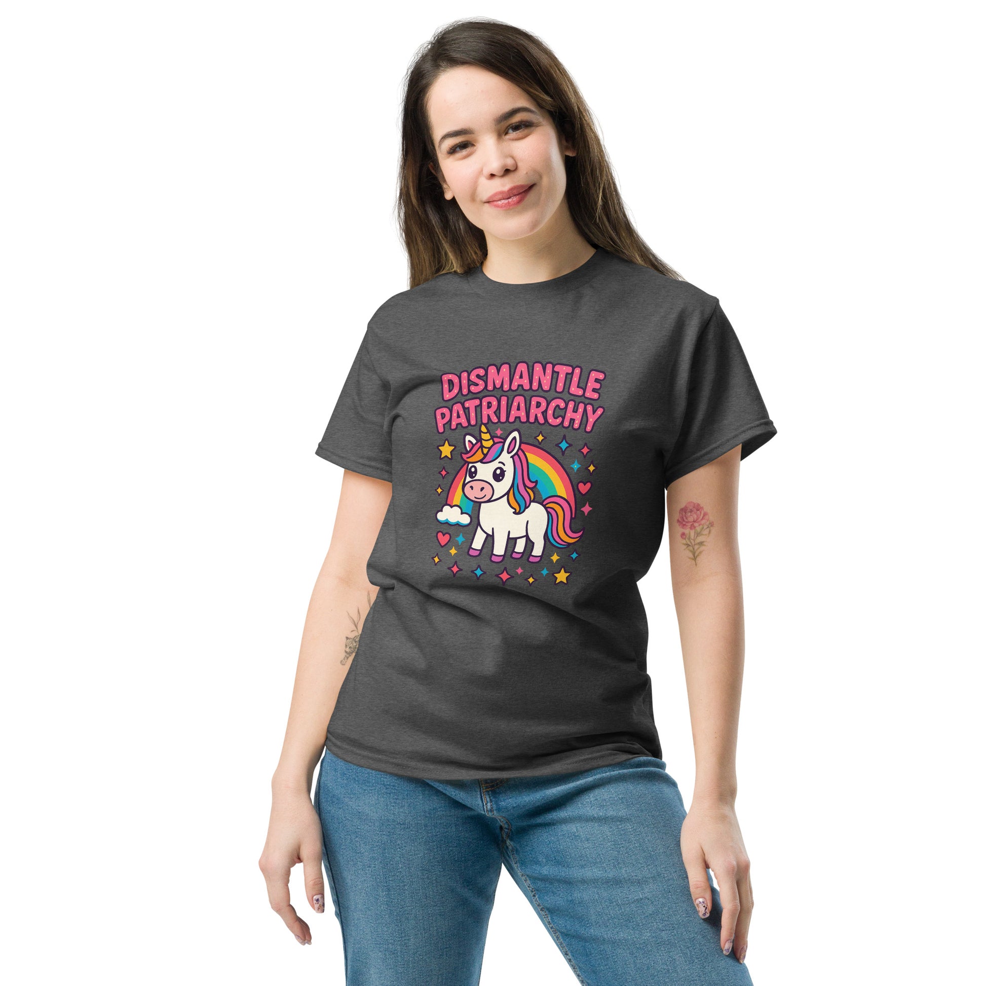 Woman wearing a dark gray t-shirt with a unicorn graphic and text on a white background