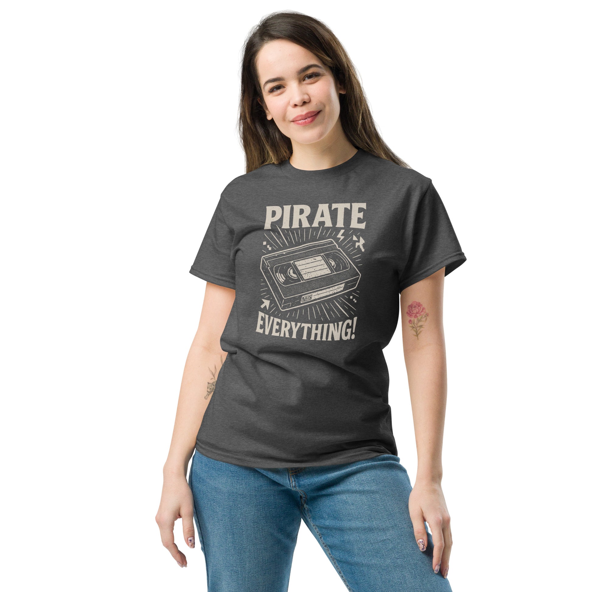 Woman wearing a dark gray t-shirt with a graphic design and text on a white background